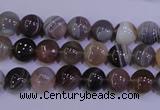 CAG4440 15.5 inches 8mm flat round botswana agate beads wholesale