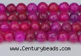 CAG9924 15.5 inches 4mm round fuchsia crazy lace agate beads