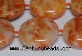 CCA477 15.5 inches 25mm flat round orange calcite gemstone beads