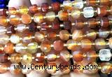 CCU1390 15 inches 6mm - 7mm faceted cube red banded agate beads
