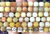 CCU1529 15 inches 8mm - 9mm faceted cube yellow aventurine jade beads