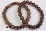 CGB4601 8mm - 9mm round golden rutilated quartz beaded bracelets