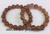 CGB4621 10mm - 11mm round golden rutilated quartz beaded bracelets