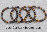 CGB6027 8mm round grade AA colorful tiger eye bracelet with skull for men