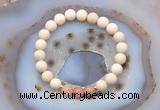 CGB6484 8mm round matte white fossil jasper & moonstone beaded bracelets