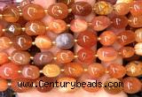 CNG9325 15 inches 10*14mm - 13*18mm nuggets red Botswana agate beads