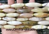 CRI143 15.5 inches 10*30mm faceted rice yellow opal gemstone beads