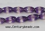 CSA25 15.5 inches 7*12mm faceted rice synthetic amethyst beads