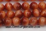 CTE1661 15.5 inches 6mm round sun orange tiger eye beads