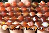 CTW582 8mm faceted & twisted S-shaped red banded agate beads