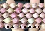 CTW670 10mm faceted & twisted S-shaped pink wooden jasper beads